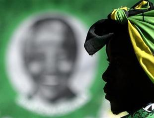 ‘Thanks to Mandela, my kids can write and read,’ South African family says