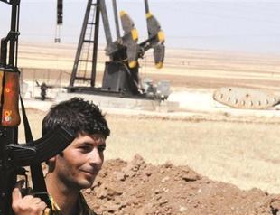 Syrian Kurds vow to fight for oil fields
