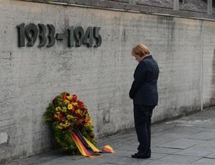 Merkel pauses election campaign to visit Dachau concentration camp