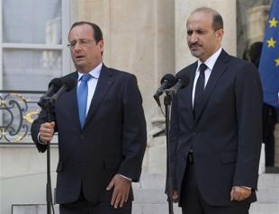 Hollande says world must act to stop Syria violence
