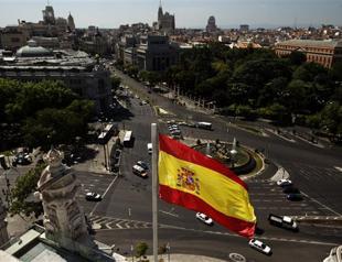 Spain says 2-year recession eased by growing exports