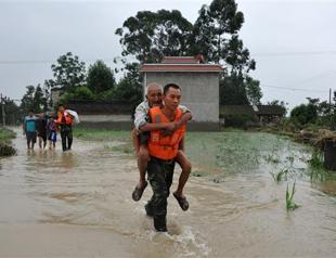 More than 200 dead or missing in China rain, landslides