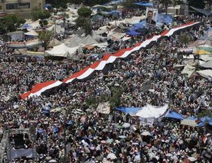Morsi supporters mass in Cairo vowing to defy coup