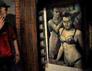Russian police seize painting of Putin in underwear