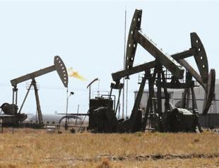 Oil hits six-month high, shares fall on Syria fears
