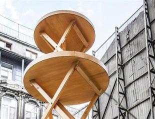 Gigantic mussel trays depict economy and changes in city