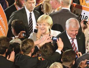 Merkel keeps strong lead despite opposition boost