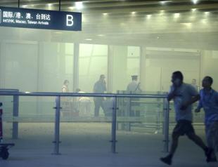 Man in wheelchair hurt after setting off explosion at Beijing airport