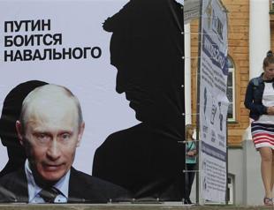 Russia pursues vandalism charges over offensive anti-Putin graffiti