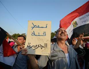 Egypt begins work on charter as Islamists press demos