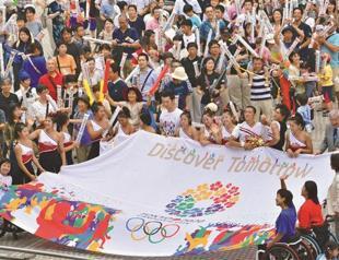 Japan Olympic win boosts Abe, but Fukushima shadows linger