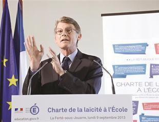 France moves to toughen ban on religion in schools