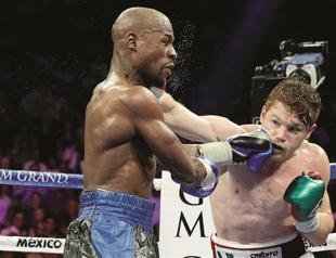 King Floyd Mayweather beats Saul Alvarez by majority decision