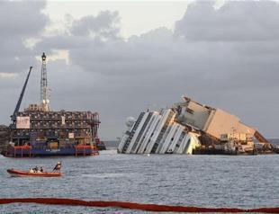 Operation to raise capsized Costa Concordia cruise ship under way