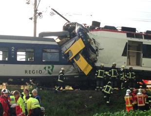 Swiss train crash kills driver, injures 35: police