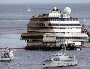 Wrecked cruise ship Costa Concordia raised off rocks in Italy