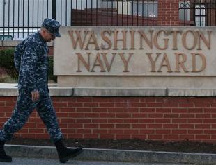 Police seek motive for deadly US naval base shooting