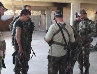 Release video footage shows Iranian officers supervising Syrian soldiers