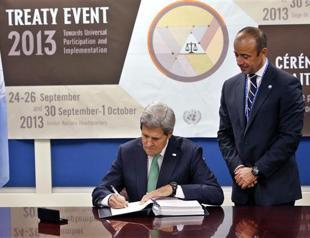 Kerry signs UN Arms Trade Treaty, says wont harm US rights