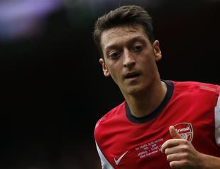 Özil aims to shoot down Swansea