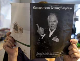 Merkel rival stirs online storm with middle-finger photo