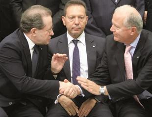 Greek recession bottoming out, finance minister says as unemployment dips