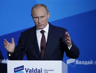 Putin says Syria chemical arms moves inspire confidence