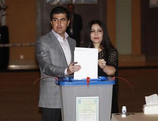 Iraqs Kurds vote amid rows, regional tensions