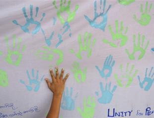 Hundreds join Myanmar march to end ethnic conflicts