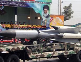 Iran showcases army power as Guards warn of US contact
