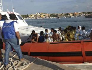 Scores dead in migrant boat disaster off Italy