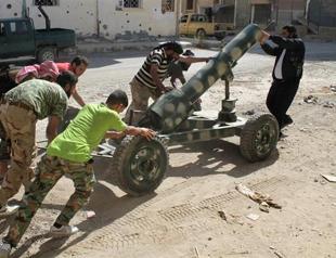 Syria rebels try to end infighting near Turkish border