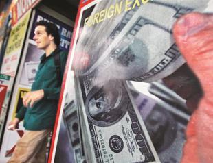 Venezuela vows crackdown on currency tourists