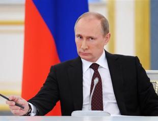 Putin says Syria very actively cooperating on disarmament