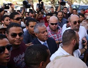 Freed Libyan PM arrives at government HQ