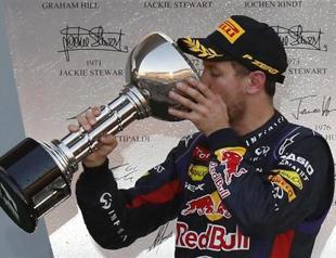 Vettel wins Japan thriller, world title on hold