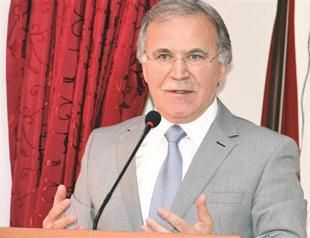 Ruling AKP official points at headscarf in Parliament