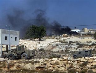 Israel troops kill militant behind Tel Aviv bus bomb