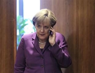 Germany summons US envoy over Merkel phone spy claims