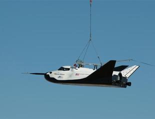 US Dream Chaser space taxi soars on test flight, skids after landing