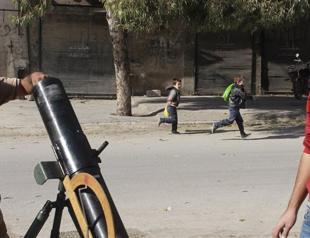 Syrian monitor group says more than 120,000 people killed in civil war