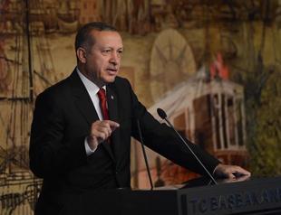 Turkish PM praises end of discrimination with removal of ban on headscarves in Parliament