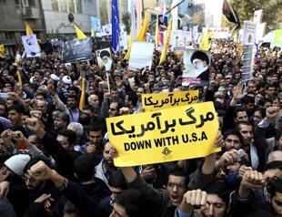 Iran hardliners jab at Rouhani on embassy siege anniversary