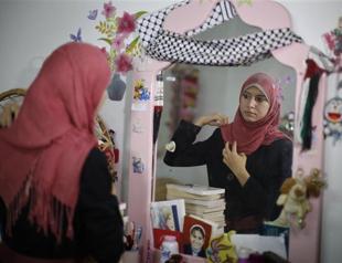 British-educated woman speaks for Hamas government in Gaza