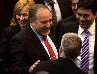 Israeli rightist Lieberman sworn back in as foreign minister