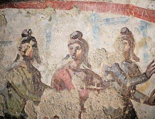 Rome catacomb frescoes add to debate on women priests