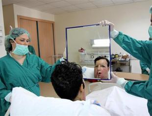 Turkey’s fifth face transplant patient sees face for first time since surgery