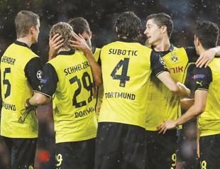 Dortmund’s ‘heavy metal’ Klopp out to silence Arsenal