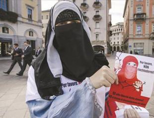 Switzerland backs ban over veils