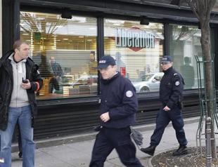 Shots fired at two Paris locations, journalist wounded